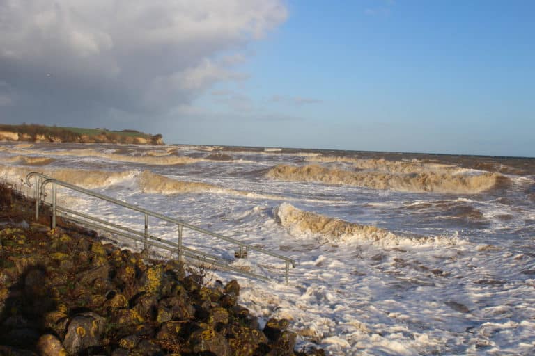 IMG_1901 – Hubertus Boltenhagen Stormy seas with big breaking waves under a blue sky.